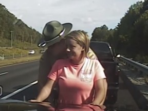 Recently released dashcam footage shows Tennessee state trooper Isaiah Lloyd patting down Patricia Wilson. (YouTube)