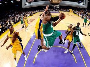 Glen Davis of the Boston Celtics goes to the basket against Kobe Bryant and Pau Gasol of the Los Angeles Lakers in Game 7 of the 2010 NBA Finals at Staples Center on June 17, 2010 in Los Angeles. (Larry W. Smith-Pool/Getty Images)