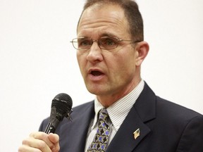 In this Oct. 4, 2010 file photo, Seaside City Council member Dennis Alexander speaks during an election forum in Seaside, Calif.