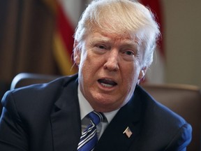 U.S. President Donald Trump speaks during a cabinet meeting at the White House, Thursday, March 8, 2018, in Washington.