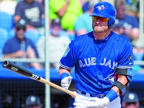 Toronto Blue Jays Josh Donaldson tosses his bat as he walks to first base during a recent exhibition game. THE CANADIAN PRESS/Frank Gunn