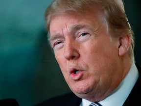 In this Feb. 15, 2018 photo, President Donald Trump speaks in the Diplomatic Room at the White House, in Washington, about the tragic school shooting in Parkland, Fla. (AP Photo/Carolyn Kaster)