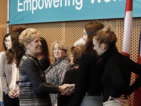 Ontario Premier Kathleen Wynne appears at an announcement to table pay transparency legislation on Mar. 6, 2018.