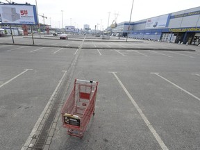 A parking lot stands empty in Warsaw, Poland, as a ban on most Sunday shopping goes into effect across the country on Sunday, March 11, 2018.