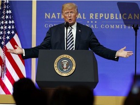In this March 20, 2018, photo, President Donald Trump speaks to the National Republican Congressional Committee March Dinner at the National Building Museum in Washington.