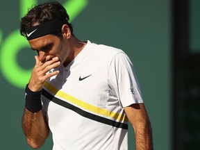 Roger Federer of Switzerland shows his dejection against Thanasi Kokkinakis of Australia in their second round match during the Miami Open Presented by Itau at Crandon Park Tennis Center on March 24, 2018 in Key Biscayne, Fla.  (Clive Brunskill/Getty Images)