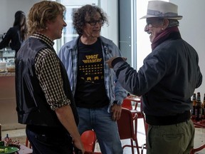 This cover image released by Warner Bros. Pictures shows Simon Pegg, from left, Mark Rylance and director Steven Spielberg on the set of "Ready Player One." (Jaap Buitendijk/Warner Bros. Pictures via AP) ORG XMIT: NYET607