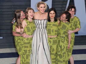 Greta Gerwig (centre) was among the stars who went to the Vanity Fair Oscars Party 2018 held at the Wallis Annenberg Center for the Performing Arts in Beverly Hills, Calif., on March 4, 2018. (Sheri Determan/WENN.com)