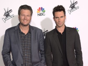 Blake Shelton and Adam Levine attend NBC's 'The Voice' Season 7 Red Carpet Event at Universal CityWalk on November 24, 2014 in Universal City, California. (Photo by Jason Kempin/Getty Images)