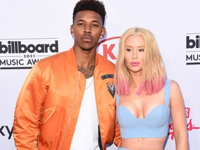 Athlete Nick Young and musician Iggy Azalea attend the 2015 Billboard Music Awards at MGM Grand Garden Arena on May 17, 2015 in Las Vegas, Nevada. (Photo by Jason Merritt/Getty Images)