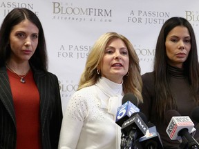 Attorney Lisa Bloom (C) holds a press conference with her clients Faviola Dadis (L) and Regina Simons, who are accusing actor Steven Seagal of sexual assault, at The Bloom Firm on March 19, 2018 in Woodland Hills, California. (Photo by Frederick M. Brown/Getty Images)