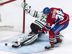 Montreal Canadiens winger Nikita Scherbak (38) scores on Dallas Stars goaltender Kari Lehtonen (32) Tuesday, March 13, 2018 in Montreal. (THE CANADIAN PRESS/Paul Chiasson)