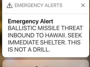 This Jan. 13, 2018 file smartphone screen capture shows a false incoming ballistic missile emergency alert sent from the Hawaii Emergency Management Agency system. Hawaii officials have repeatedly pointed to a low-level state employee and a breakdown in his agency's leadership as the main cause for a missile alert that left hundreds of thousands of islanders thinking they might die in a nuclear blast in January. But efforts to find out more about what other top officials did that day have been stymied at the highest levels of state government.