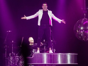 Jacob Hoggard, right, frontman for the rock group Hedley, performs during the band's concert in Halifax on Febr. 23, 2018.