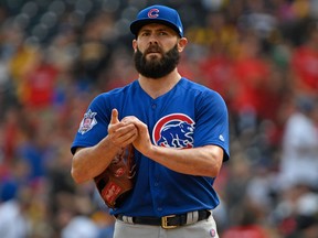 Jake Arrieta of the Chicago Cubs reacts after giving up a single to David Freese of the Pittsburgh Pirates in the first inning during a game at PNC Park on Sept. 4, 2017