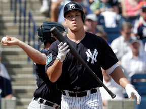 New York Yankees' Aaron Judge reacts after he struck out swinging during the first inning of a baseball spring exhibition game against the Detroit Tigers on Feb. 28, 2018