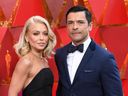 Kelly Ripa and her husband Mark Consuelos arrive for the 90th Annual Academy Awards on March 4, 2018, in Hollywood. (ANGELA WEISS/AFP/Getty Images)