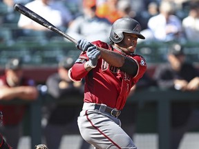 Arizona Diamondbacks' Ketel Marte hits a triple off San Francisco Giants' Jeff Samardzija during a spring training game on Tuesday, Feb. 27, 2018, in Scottsdale, Ariz. (AP Photo/Ben Margot)