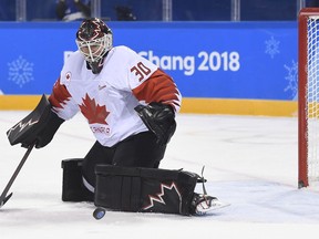 In this Feb. 15, 2018, file photo, Canada goaltender Ben Scrivens makes a save against Switzerland during hockey action at the 2018 Olympic Winter Games in Pyeongchang, South Korea