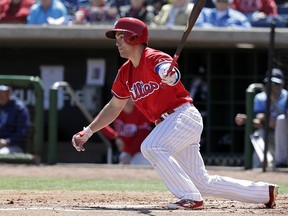 In this March 13, 2018, file photo, Philadelphia Phillies' Scott Kingery bats in a spring exhibition game against the Tampa Bay Rays, in Clearwater, Fla. (AP Photo/John Raoux, File)