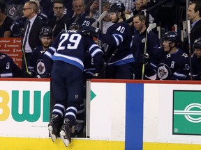 Winnipeg Jets right winger Patrik Laine leaves the ice after getting hurt against the Los Angeles Kings during NHL action on March 20, 2018