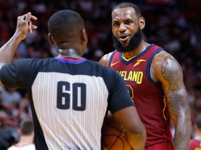 Cleveland Cavaliers forward LeBron James argues a call with referee James Williams in the fourth quarter of play against the Miami Heat during an NBA basketball game on March 27, 2018