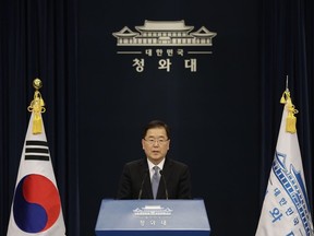South Korean delegation head, National Security Director Chung Eui-yong speaks to the media at the presidential Blue House in Seoul, South Korea, Tuesday, March 6, 2018. The delegation led by Chung returned to the South Tuesday after North Korean leader Kim Jong Un held an "openhearted talk" with the envoys.