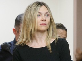 This Feb. 14, 2013 file photo shows Amy Locane Bovenizer entering the courtroom to be sentenced in Somerville, N.J.  for the 2010 drunk driving accident in Montgomery Township that killed 60-year-old Helene Seeman. (AP Photo/The Star-Ledger, Patti Sapone, File)