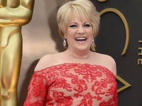 FILE - This March 2, 2014, file photo shows Lorna Luft at the Oscars in Los Angeles. Singer Luft, the daughter of Judy Garland, collapsed backstage after a concert in London, Friday, March 9, 2018, and was rushed to the hospital, where she was undergoing tests, a representative said.