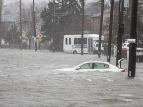 A flooded car sits in Hough's Neck due to a strong coastal storm on March 2, 2018 in Quincy, Massachusetts. (Scott Eisen/Getty Images)