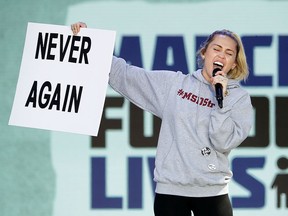 Miley Cyrus performs "The Climb" during the March for Our Lives rally on March 24, 2018 in Washington, D.C. (Chip Somodevilla/Getty Images)