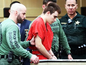 Nikolas Cruz is escorted into the courtroom for his arraignment at the Broward County Courthouse March 14, 2018 in in Fort Lauderdale, Florida. (GETTY)