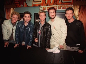 Anxious fans wait outside the downtown HMV for popular boy band N'Sync (from left, Justin Timberlake, Chris Kirkpatrick, Lance Bass, Joey Fatone and JC Chasez) in this photo from March 22, 2000.