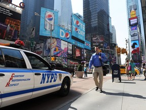 In this April 8, 2010 file photo, a New York City Police Department car is pictured in New York's Times Square. (Stan Honda/Getty Images)