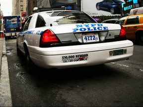 A New York Police Department car sits parked in Times Square in New York City on Aug. 12, 2013.