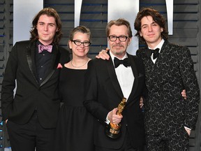 (L-R) Gulliver Oldman, Gisele Schmidt, Gary Oldman and Charlie Oldman attend the 2018 Vanity Fair Oscar Party hosted by Radhika Jones at Wallis Annenberg Center for the Performing Arts on March 4, 2018 in Beverly Hills, Calif.  (Dia Dipasupil/Getty Images)