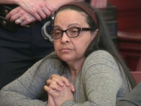 In this image from video, Yoselyn Ortega, a trusted nanny to a well-to-do family, listens to court proceedings during the first day of her trial,in New York, March 1, 2018. (WYNY-TV/Pool Photo via AP)
