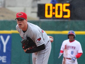 In this April 9, 2015, file photo, Rochester Red Wings pitcher Alex Meyer (32) looks in for a signal as a 20-second pitch clock is used in Buffalo, N.Y.