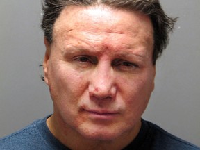 This booking photo released March 15, 2018, by the Warwick Police Department shows five-time world boxing champion Vinny Paz, arrested after a domestic incident in Warwick, R.I.