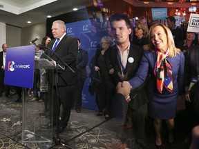 Doug Ford is elected as the new leader of the PC Party of Ontario at the Ontario PC leadership convention on Sunday March 11, 2018 next to runner up Christine Elliott.