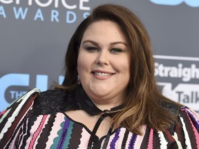 FILE - In this Jan. 11, 2018 file photo, Chrissy Metz arrives at the 23rd annual Critics' Choice Awards in Santa Monica, Calif. Metz writes about her early struggles with weight and poverty and her later success as an actress in her new memoir, "This Is Me."
