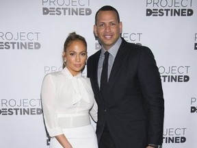 Jennifer Lopez, left, and Alex Rodriguez arrive at Project Destined Bronx Bootcamp at Yankee Stadium on Sunday, March 4, 2018, in New York.