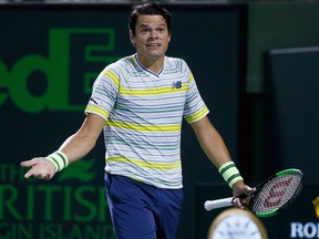 Milos Raonic gestures after losing a point to Juan Martin del Potro in the quarterfinals of the Miami Open tennis tournament on March 28, 2018, in Key Biscayne, Fla.