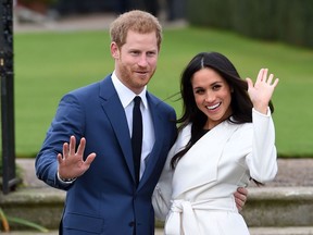 FILE - In this Nov. 27, 2017 file photo, Britain's Prince Harry, left, and Meghan Markle pose for the media at Kensington Palace in London. The royal nuptials will take place on Saturday, May 19, beginning at 7 a.m. Eastern time in the U.S. and fans are already planning their viewing parties.