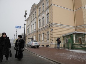 People walk passed the British Consulate General, in St.Petersburg, Russia, Saturday, March 17, 2018.  (AP Photo/Dmitri Lovetsky)