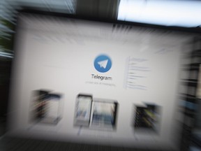 The website of the Telegram messaging app is seen on a computer's screen in Moscow, Russia, Tuesday, March 20, 2018.