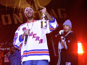 RZA, and U-God on back right, of the Wu-Tang Clan performs during a party to celebrate the release of their new album "Iron Flag" at the Hammerstein Ballroom in New York City on Dec. 19, 2001. (Scott Gries/ImageDirect/Getty Images)