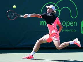 Denis Shapovalov of Canada serves against Damir Dzunhur of Bosnia and Herzegovina during Day 6 of the Miami Open at the Crandon Park Tennis Center on March 24, 2018 in Key Biscayne, Fla.  (Al Bello/Getty Images)