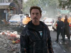 Marvel Studios' AVENGERS: INFINITY WAR..Tony Stark/Iron Man (Robert Downey Jr.) w/ Doctor Strange (Benedict Cumberbatch), Bruce Banner (Mark Ruffalo) and Wong (Benedict Wong) in the background L to R. (Photo: Film Frame. Marvel Studios)