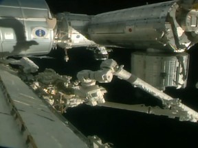 Video screengrab of the spacewalk outside the International Space Station. (NASA/HO)